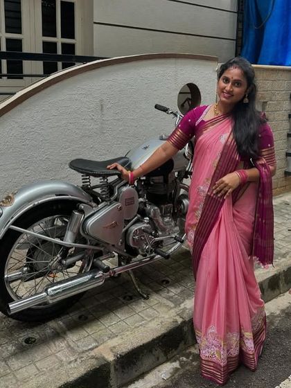 A lovely client looking beautiful in a pink pure Mysore crepe saree with embroidery. Thank you for sharing your picture.