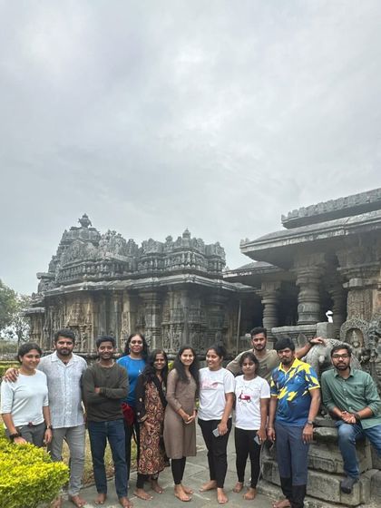 Another group photo at a historic temple, showing that our treks are a complete cultural experience of the Malenadu region.