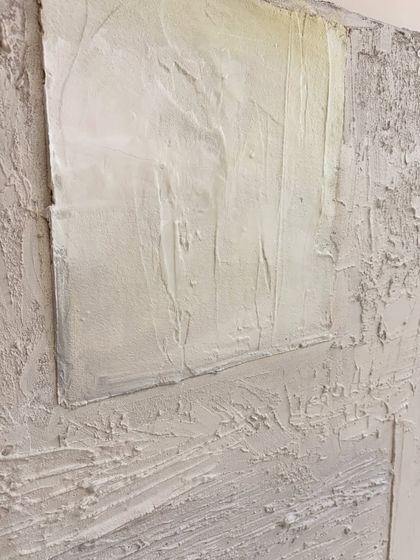 Another detail shot of the Houston commission, highlighting the layered effect of the texture work. The neutral color palette allows the sculptural quality of the piece to be the main focus.