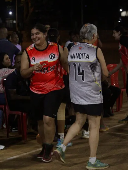Players from different teams sharing a friendly moment. It's all about sportsmanship and community.