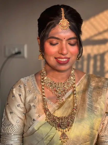 A sun-kissed shot of my beautiful South Indian bride, her skin glowing and her makeup looking flawless.