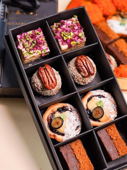 The Malcha Box is designed to be the perfect 'thank you' gift when visiting friends and family during Diwali. It's filled with our most popular sweet bites, offering a modern twist on traditional Indian mithai.
