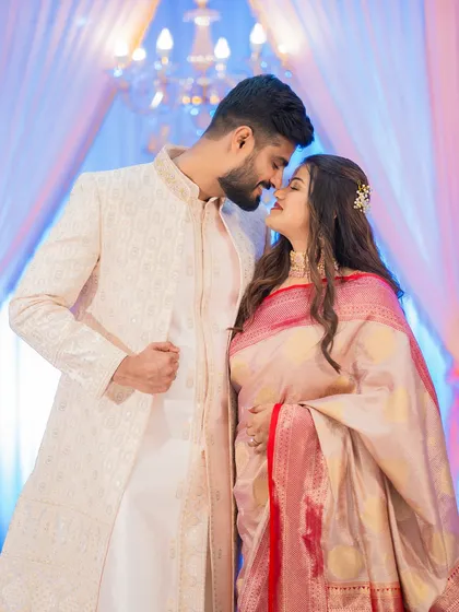 An intimate portrait of Prachi and Sandeep at their engagement. The soft lighting and close framing create a romantic and timeless feel.
