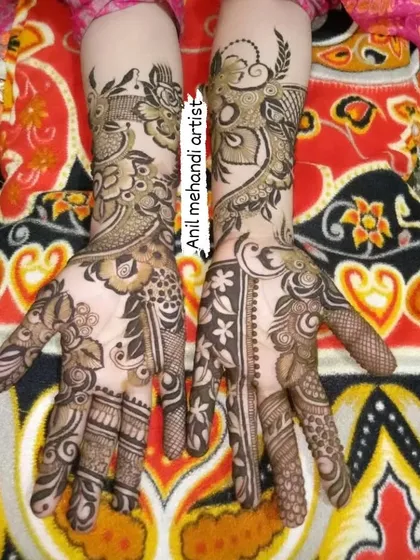 This design shows a creative mix of styles. One hand features a traditional floral pattern, while the other has a more modern, spaced-out design.