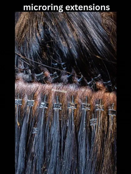 A detailed close-up of micro ring extensions. You can see how the small rings are attached neatly in rows, providing a secure and long-lasting solution for fuller hair.