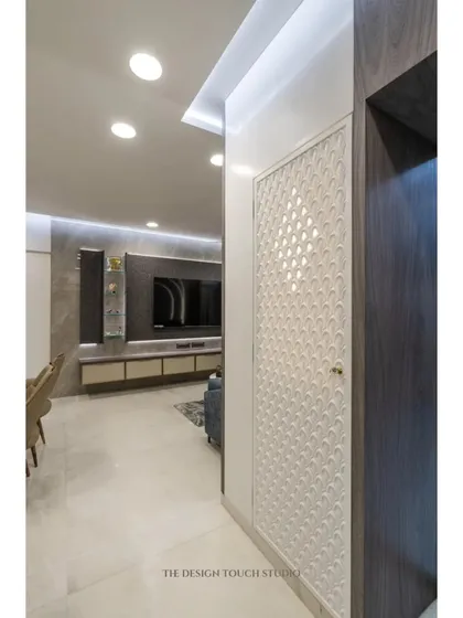 A side view showing how the compact mandir unit fits perfectly into the home's layout, providing a dedicated spiritual corner without disrupting the flow of the space.