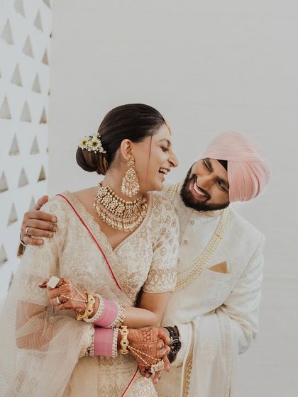 The kind of laughter that fills a room. This candid portrait of Ricky and Ria showcases the pure joy and infectious energy that made their wedding day so special.