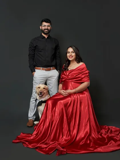 The whole family is here. This adorable portrait includes the couple's dog, dressed in a tiny tuxedo to match the occasion.