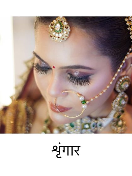 A beautiful, artistic shot focusing on the bride's stunning eye makeup. The long, full lashes and expertly blended eyeshadow are key elements in creating this captivating bridal look.