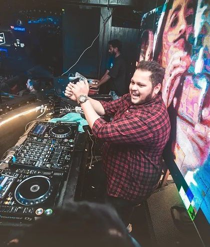 A fisheye lens shot capturing my interaction with the crowd and the dynamic energy of the room.