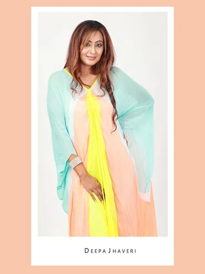 A colorful brand shoot featuring stand-up comedian Deepa Jhaveri in a beautiful Wendell Rodricks kaftan. This image captures the breezy, artistic vibe of the designer label.