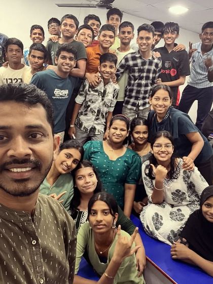 Celebrating Day 8 of Navratri with the elegance of peacock green. Our students and teachers embrace the festive spirit with color-coordinated outfits.