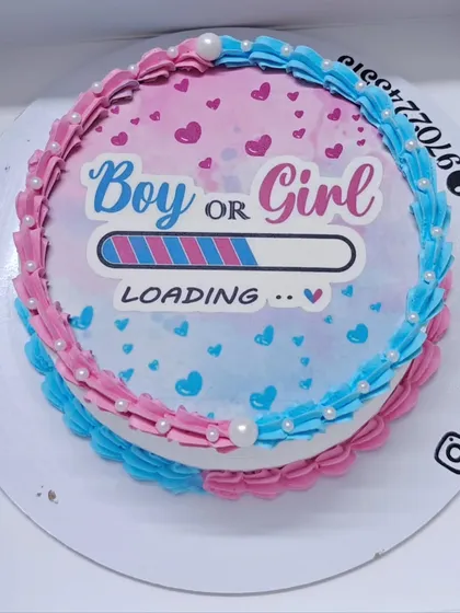 A "Boy or Girl Loading..." cake for a modern and fun baby shower. This design is perfect for a tech-savvy couple eagerly awaiting their new arrival.