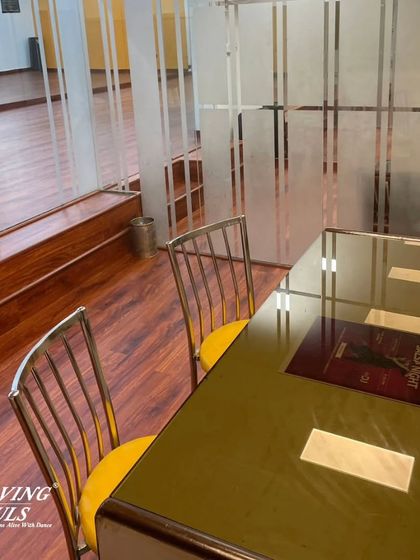 A view of our reception area from inside the studio. The glass partition maintains an open and connected feel.