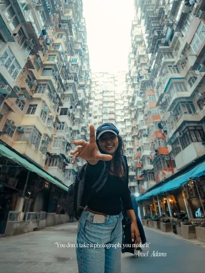 Here I am at the iconic "Transformers Building" in Hong Kong. As a travel photographer, I'm constantly exploring, camera in hand. This photo captures my passion for discovering new places and making, not just taking, a photograph.