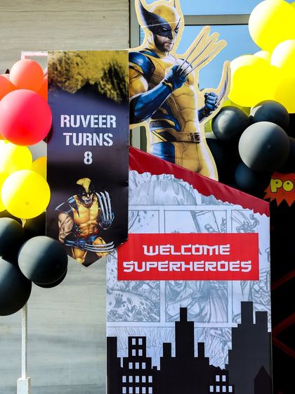 Personalized welcome signage featuring Wolverine for the birthday boy's 8th birthday celebration.
