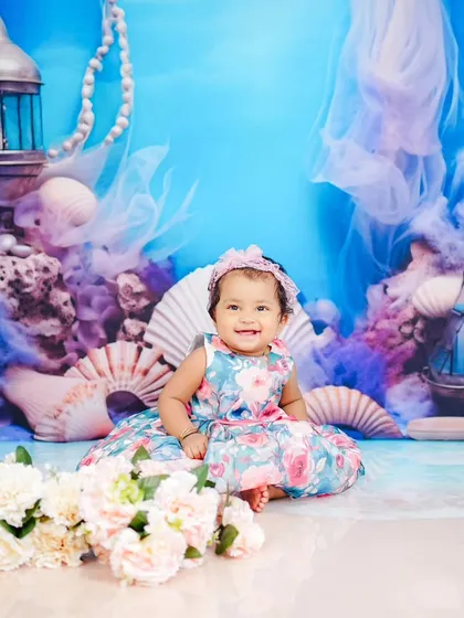 A beautiful underwater ocean theme, different from the mermaid shoot. This setup uses rich blues and purples to create a magical sea-floor grotto.