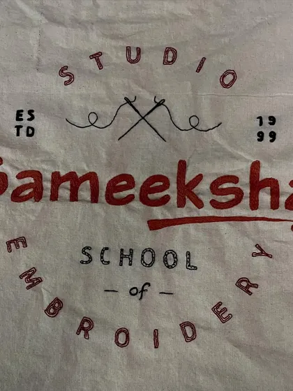 The logo for Sameeksha Studio and School of Embroidery, hand-stitched and ready to be framed. It felt right to represent my brand using the very craft I teach.