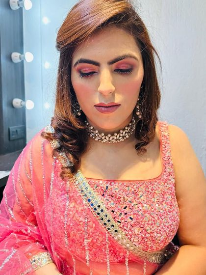 A closer look at the pink-toned party makeup, showing the seamless blending on the eyes and the flawless skin finish.