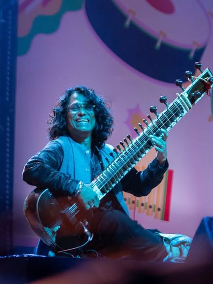 A photo of me, lost in the music, during our set at the Mahindra Percussion Festival. It's a joy to perform with such a talented band.
