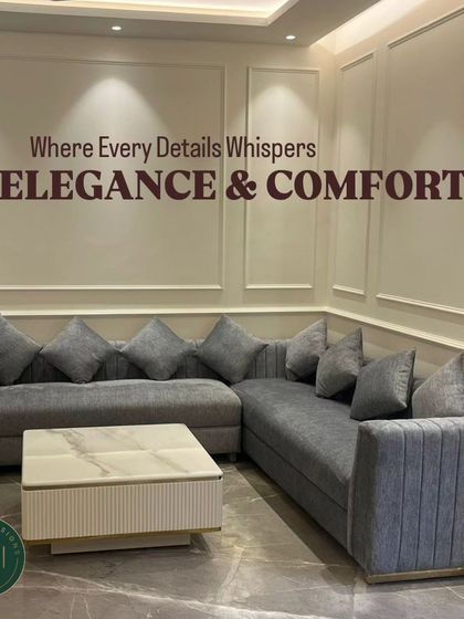 This L-shaped sectional sofa in a versatile grey fabric is designed for ultimate comfort and modern living. Paired with a marble and fluted wood coffee table, this custom seating arrangement maximizes space while offering a sophisticated look.