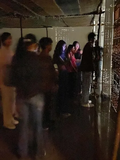 The NIFT students exploring the immersive 'WEAVING LIGHT' installation.