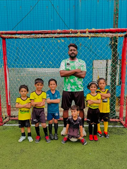 Our toddlers' batch with their coach. We focus on making football fun and accessible for the youngest kids.