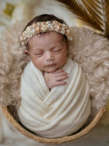 Tiny toes, endless love. This boho-inspired swaddle shot is all about natural textures and a soft, neutral color palette.