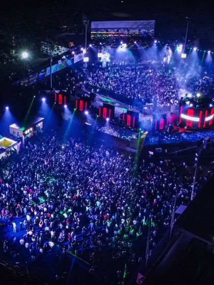 Another incredible aerial view of the 360-degree concert, showing the massive turnout and immersive experience.
