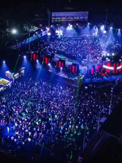 Another incredible aerial view of the 360-degree concert, showing the massive turnout and immersive experience.