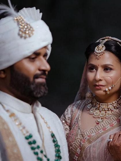 A close-up of the couple in the woods, their expressions conveying a deep and soulful connection.