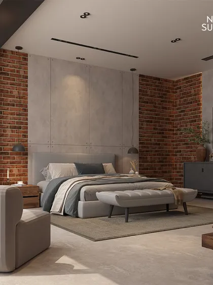 We love blending raw textures to create sophisticated, modern spaces. This industrial-style bedroom combines the ruggedness of an exposed brick wall with the clean finish of concrete panels and the warmth of wood, resulting in a master suite that is both edgy and comfortable.