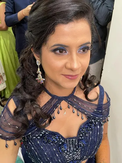 Another angle of the sangeet look, showing the shimmering blue eyeshadow.