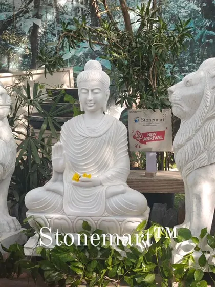 This grand display features a 4-foot white marble Buddha statue flanked by a pair of majestic 4-foot marble lions. This arrangement is perfect for creating a powerful and serene entrance for a farmhouse, hotel, or luxury residence, showcasing our ability to create large-scale garden ornaments.