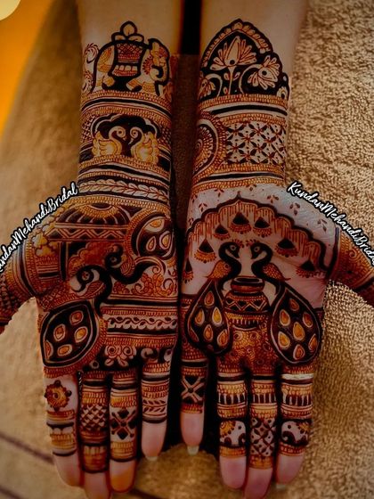 An intricate design featuring peacocks and kalash motifs, perfect for a bride who wants a very traditional and detailed look.