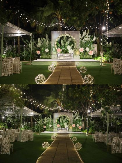The perfect setting for a pre-wedding cocktail party or sangeet night. The lawn provides ample space for a dance floor, while the surrounding trees, lit with elegant chandeliers and string lights, create a festive and celebratory atmosphere.