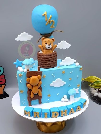 Our popular teddy bear half-birthday cake design, customized for baby Mridhaa.
