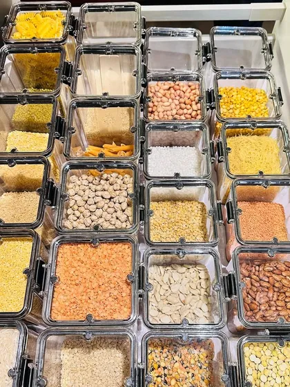 How fabulous does this look? Using the same type of airtight containers in a drawer gives you full visibility of your grains and pulses, helping you avoid waste and bulk buying.