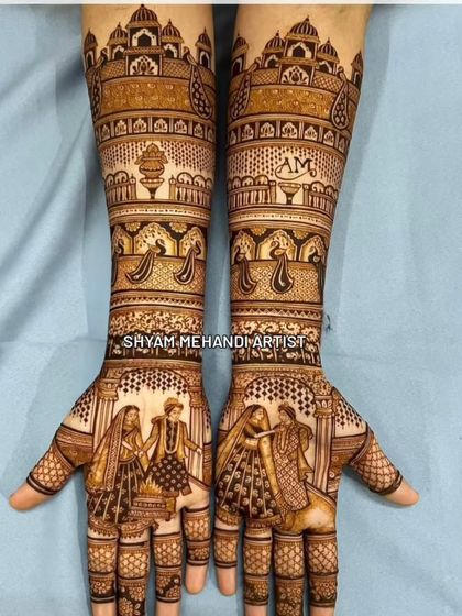 A grand design featuring wedding portraits on the palms and architectural details extending up the arms.