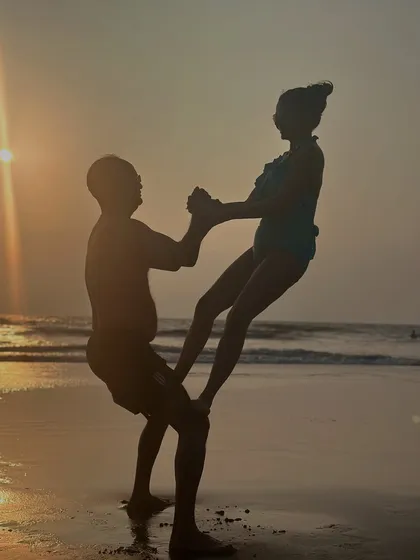 This supported squat and lift is a playful exploration of balance and strength. Partner yoga is not just about the poses, but about sharing laughter and creating beautiful memories together.