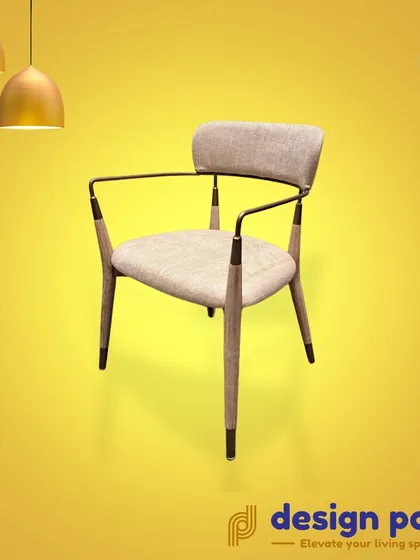 This creative chair design with a slim metal frame is a statement piece that combines comfort with artistic flair.