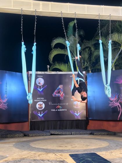 Cheers to 4 years of YWS. This image from our fourth-anniversary event showcases the different dimensions of our offerings: Yoga, Aerial Yoga, Meditation, and Sound Healing.