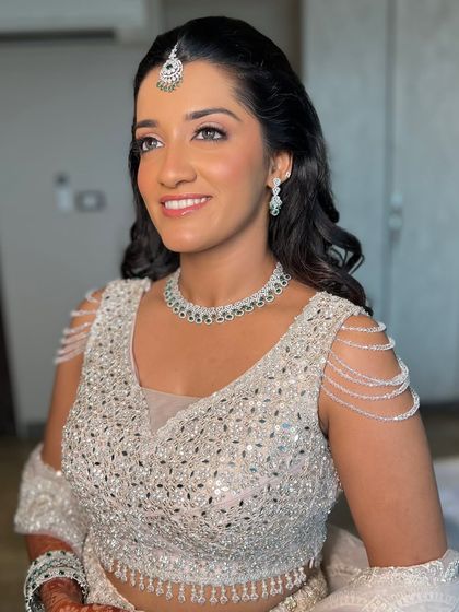 The perfect balance of shimmer and subtlety. This look was all about creating a radiant glow for her special day.