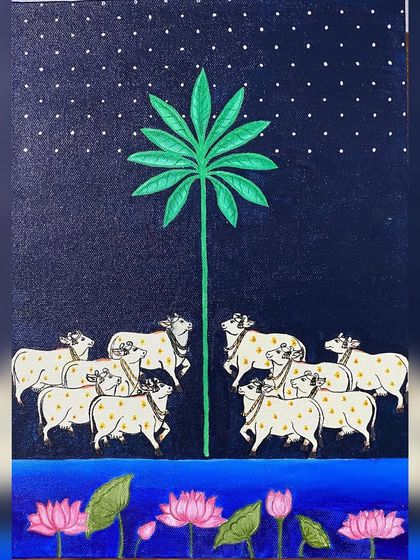 A smaller Pichwai painting on canvas, commissioned as a housewarming gift. This piece captures the serene scene of cows gathering by the water under a starry sky.