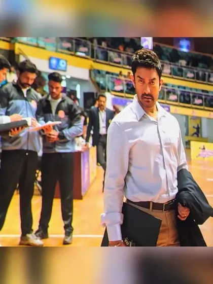 A scene from the film where I am in the background as the coach of the opposing team. Seeing our academy and myself on the big screen was a moment of immense pride.