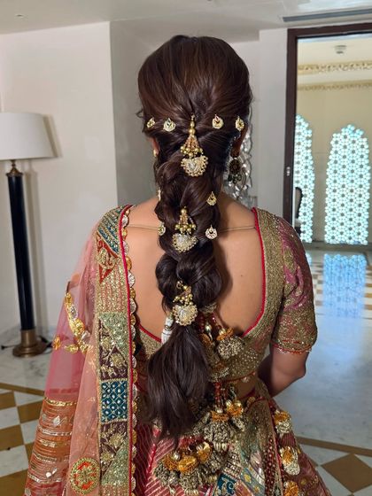 Another angle of the traditional gold-accessorized braid, showing its thickness and the beautiful way it falls.