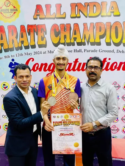 With my coaches and mentors after the Senior National medal ceremony. Their belief in my abilities is a constant source of motivation.