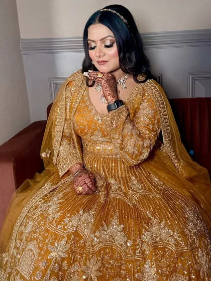 Another beautiful shot of this yellow engagement look, showing off the intricate embroidery and jewellery.