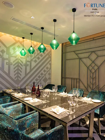 The elegant setup of our private dining area, where modern lighting and luxurious seating create the perfect mood for an exclusive meal.