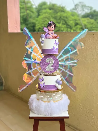 A magical second birthday cake that brings a fairy theme to life with iridescent kinetic wings. We guide you through creating multi-dimensional cakes, from fondant figure modeling to assembling moving parts that will be the centerpiece of any party.